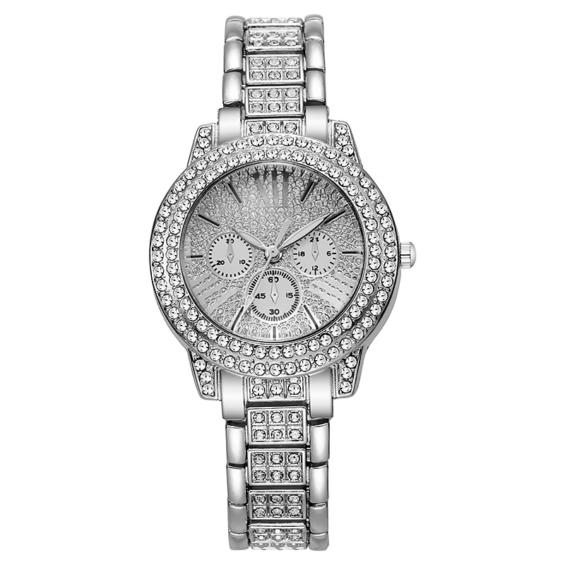 Women's rhinestone watch and diamond bracelet