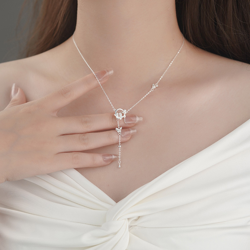 Sterling silver butterfly ring tassel necklace, simple and unique design, sweet and elegant sweater chain.